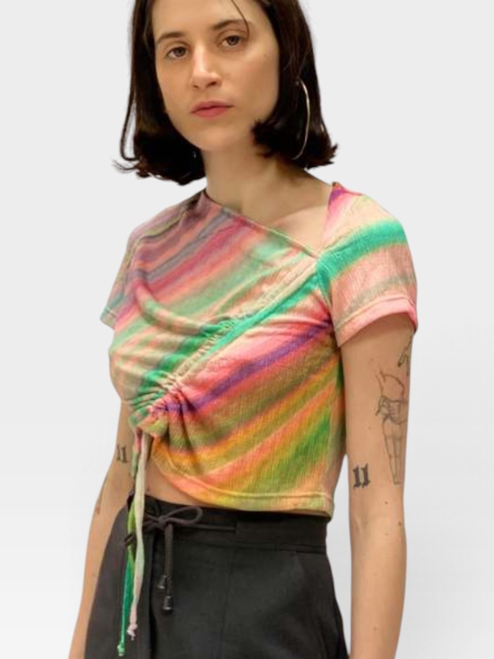 Tach Clothing Clarissa Top featuring a colorful, diagonal rainbow tie-dye L